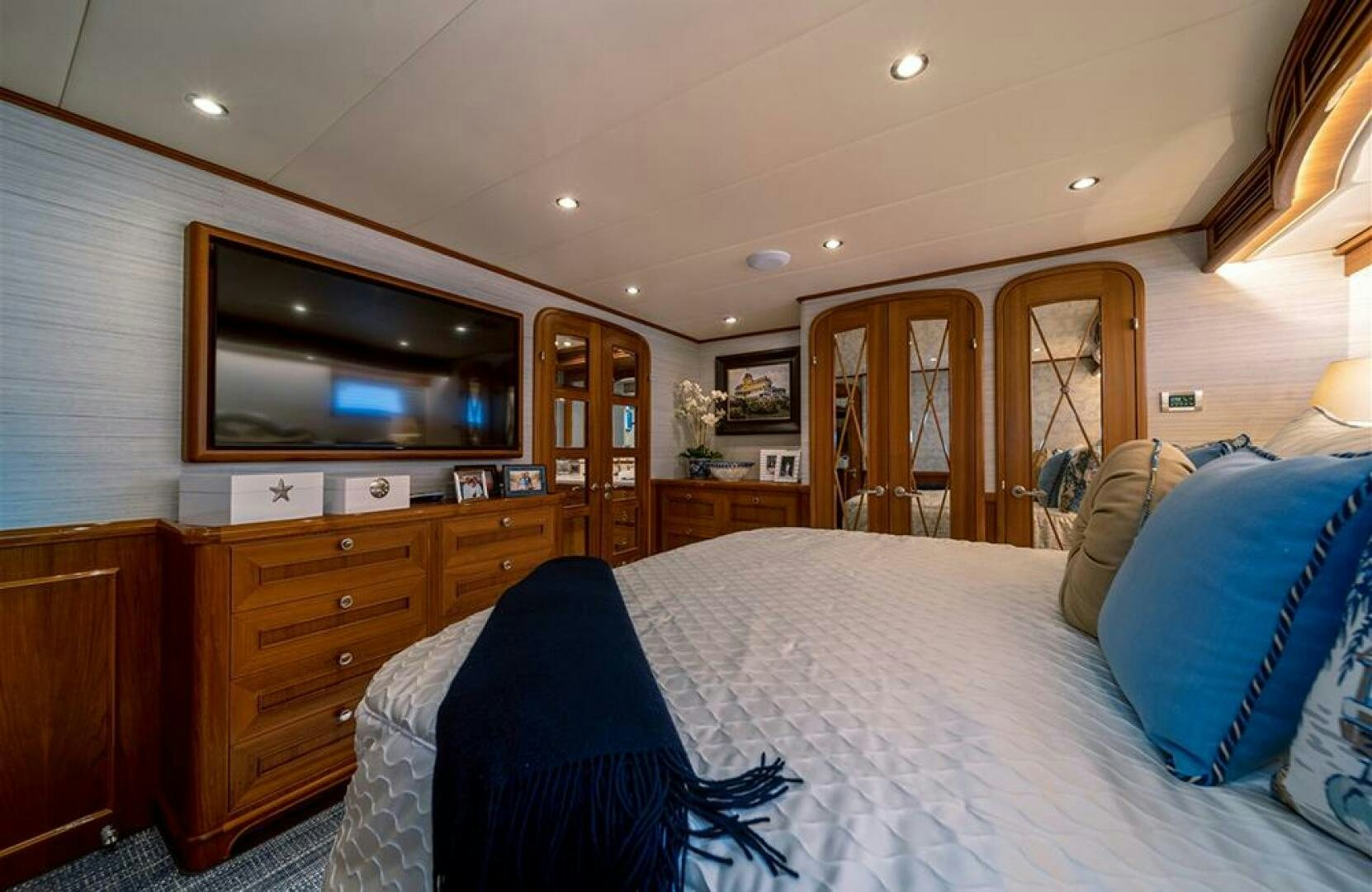 a bedroom with a large bed aboard JULIANNE Yacht for Sale