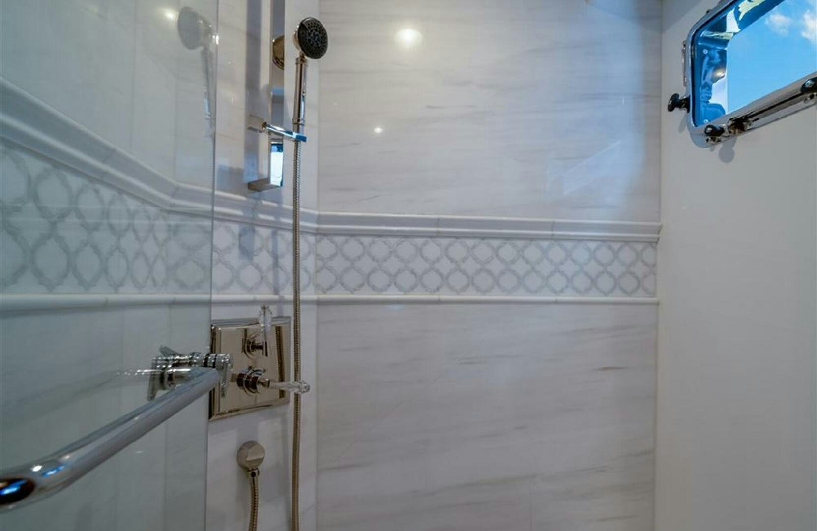 a bathroom with a shower aboard JULIANNE Yacht for Sale