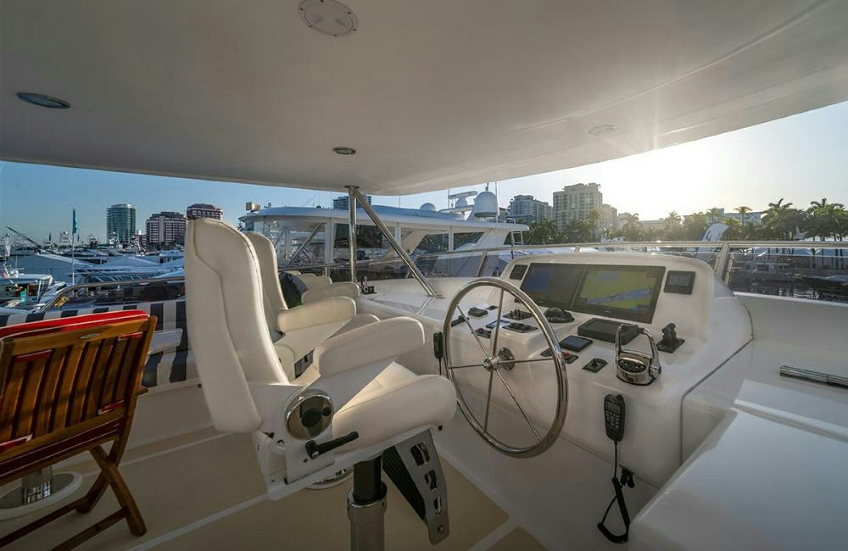 a white car on a deck aboard JULIANNE Yacht for Sale
