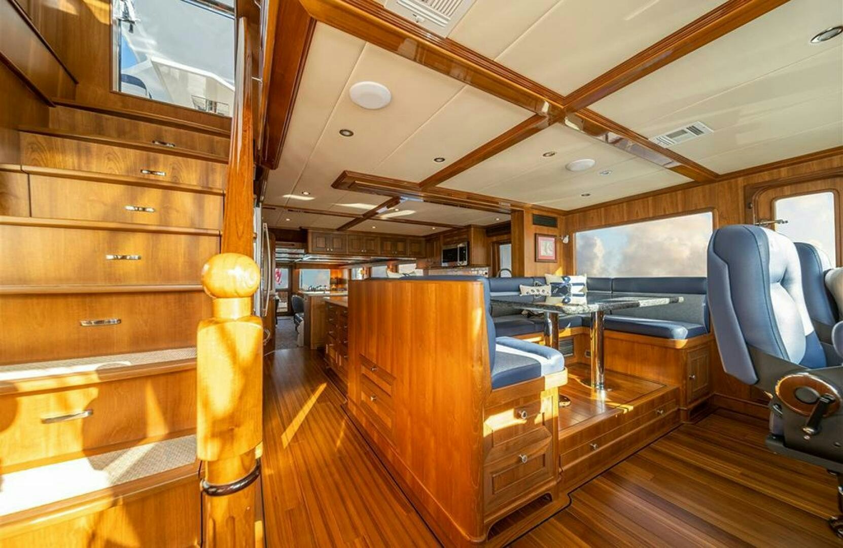 a room with wooden furniture aboard JULIANNE Yacht for Sale
