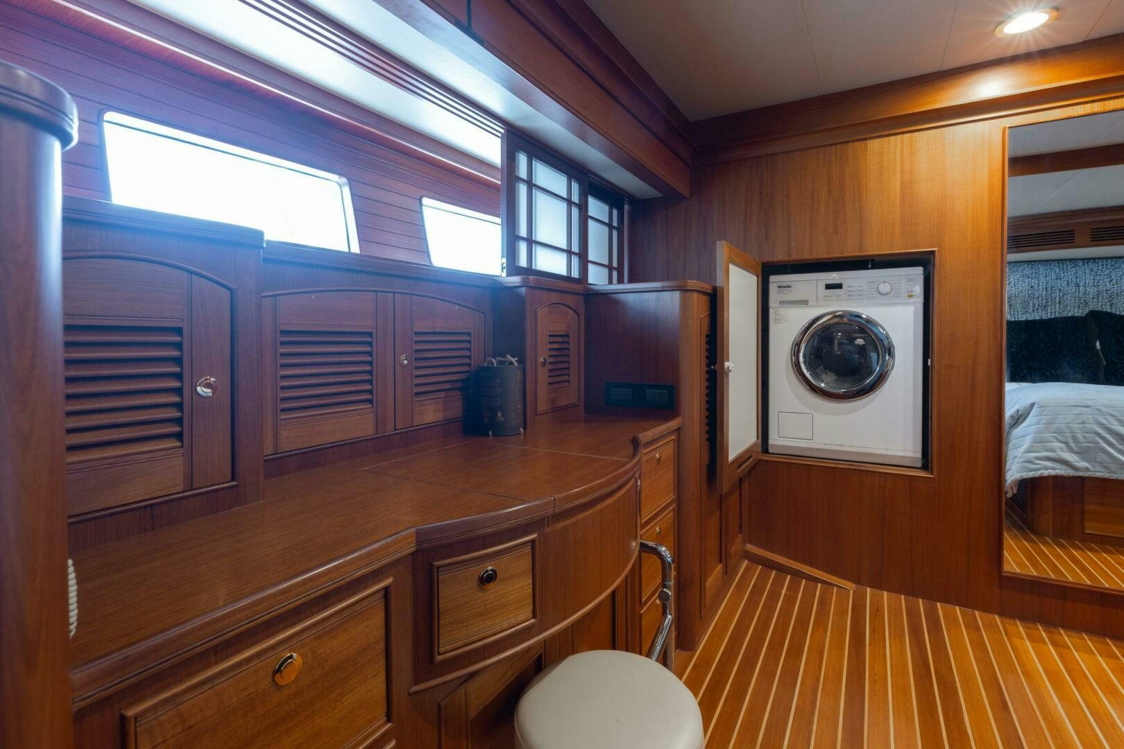 a room with a washing machine and a window aboard VIRGINIA SEA Yacht for Sale