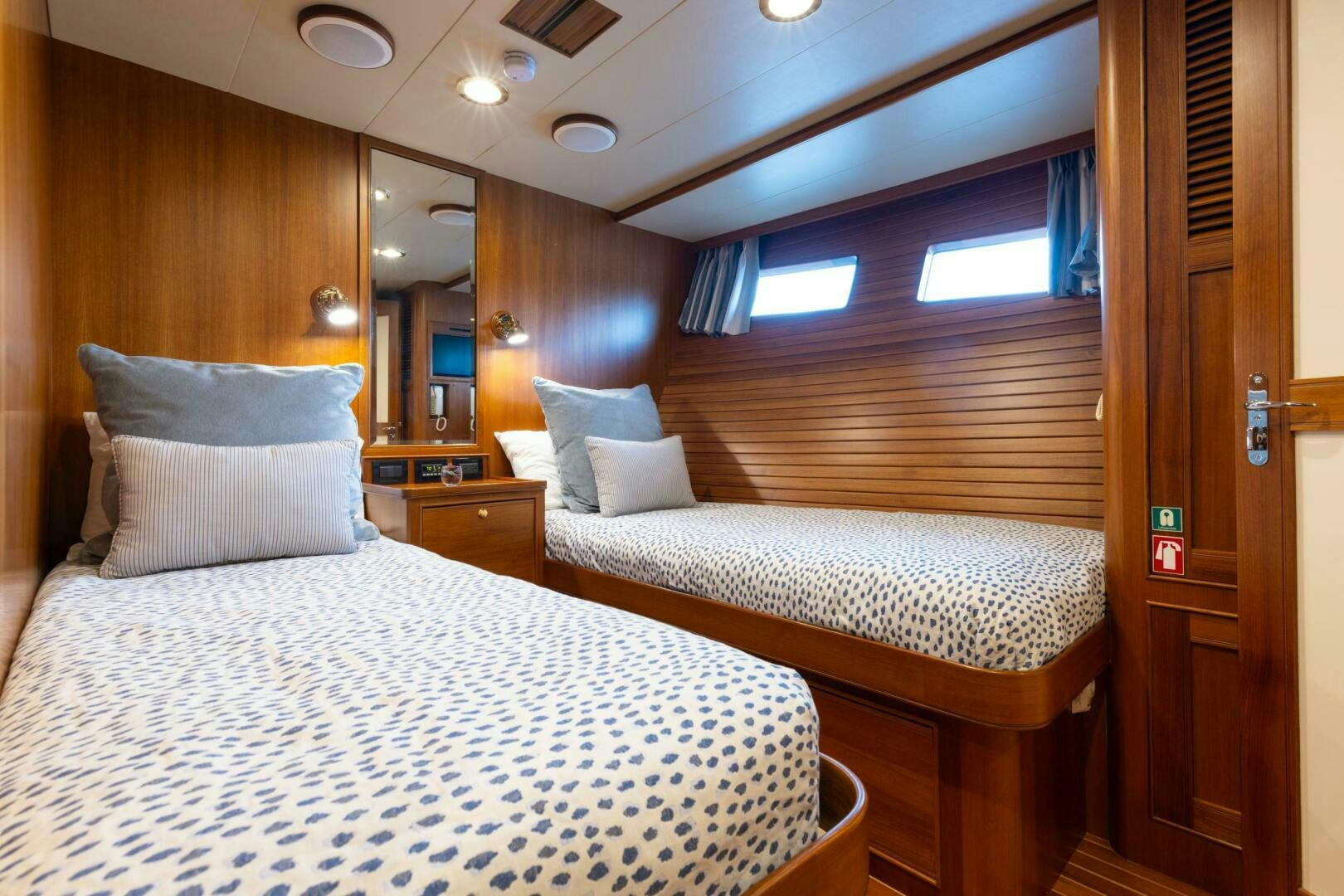 a couple of beds in a hotel room aboard VIRGINIA SEA Yacht for Sale