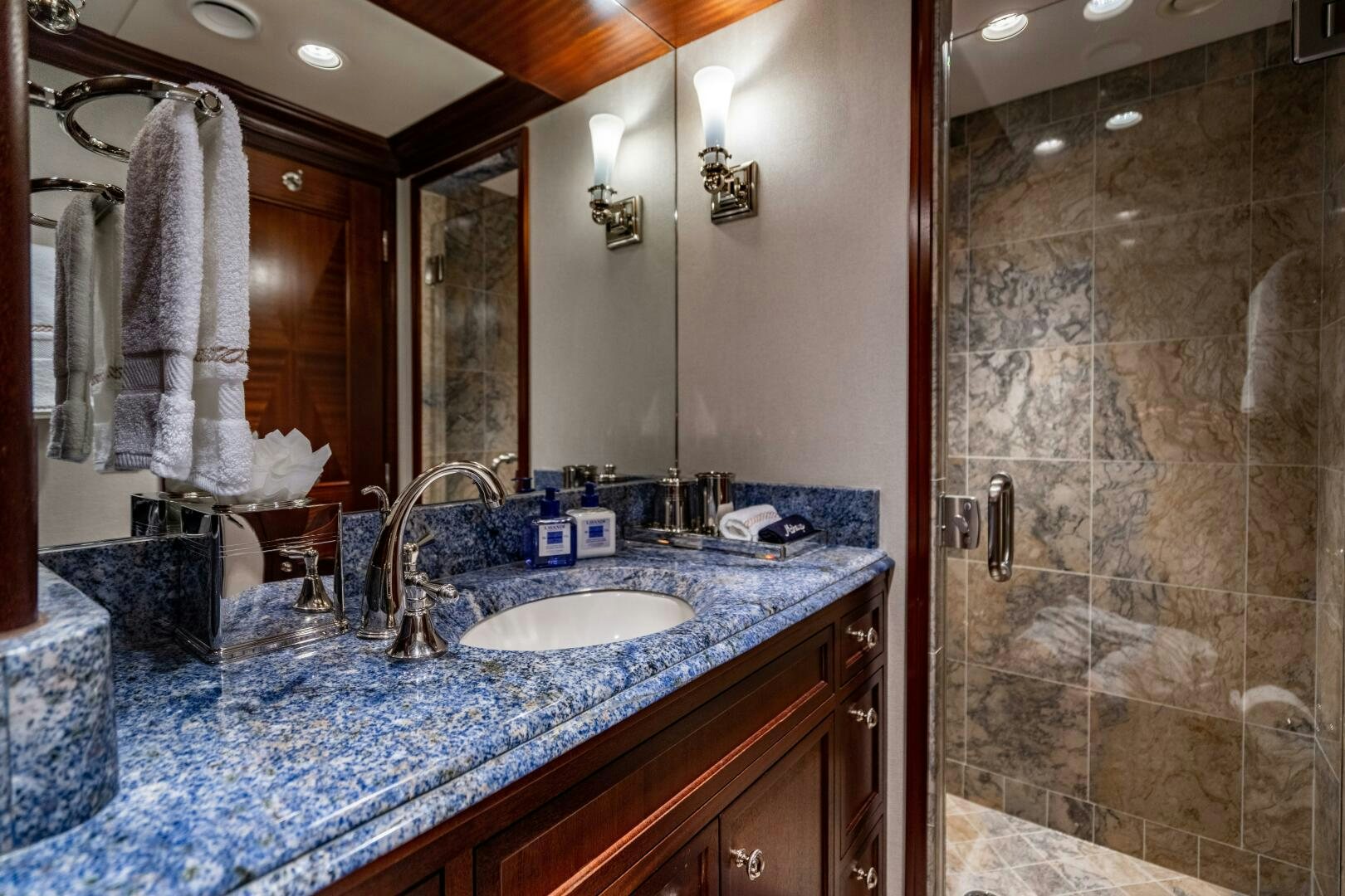 a bathroom with a marble counter top aboard ZEXPLORER Yacht for Sale
