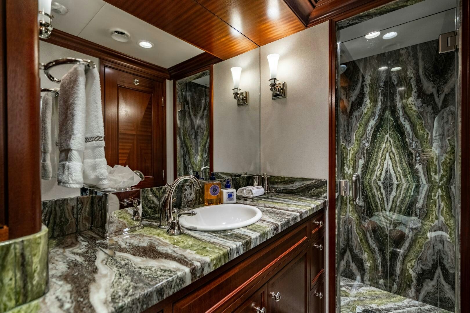 a bathroom with a large marble countertop aboard ZEXPLORER Yacht for Sale