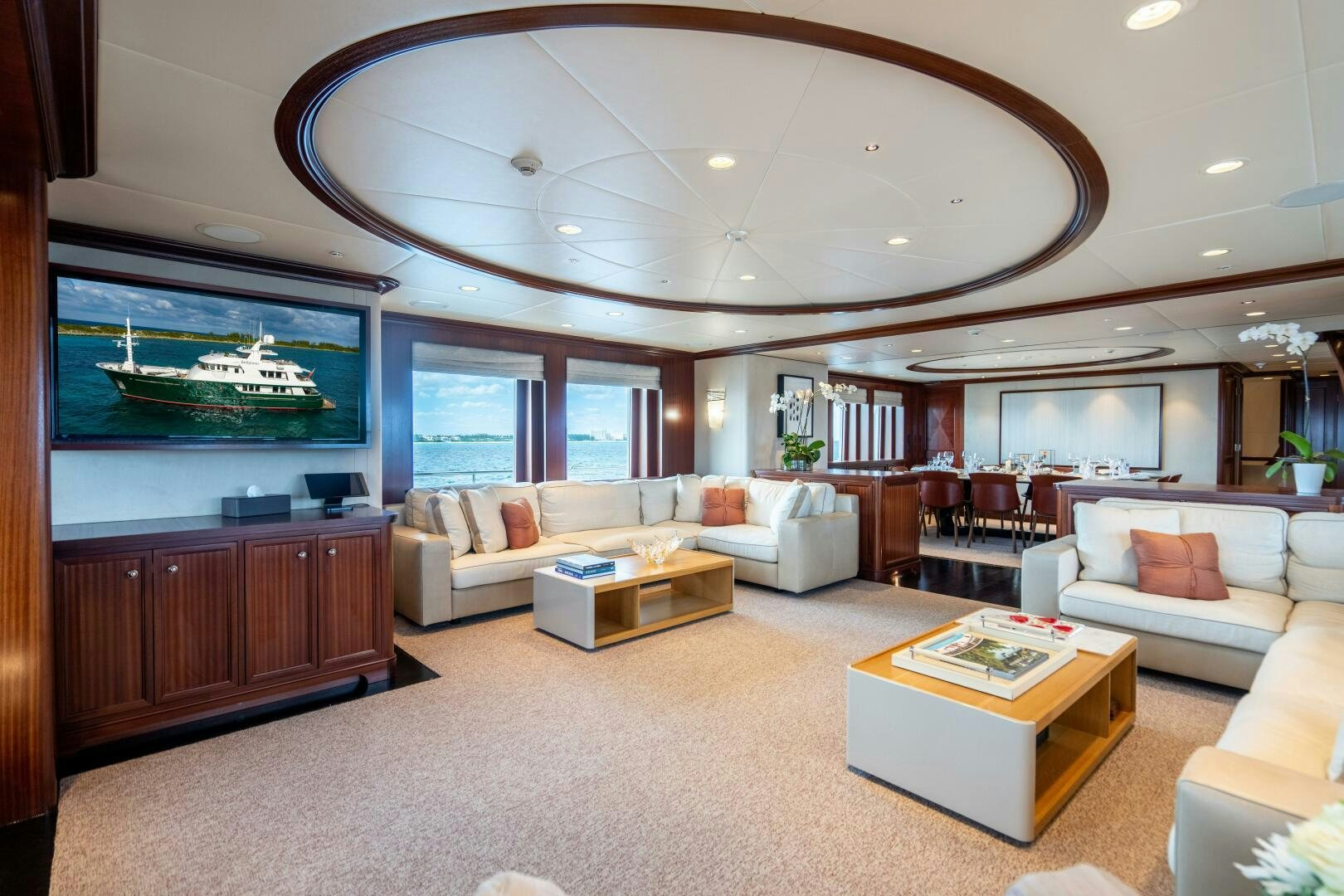 a living room with a large fireplace aboard ZEXPLORER Yacht for Sale