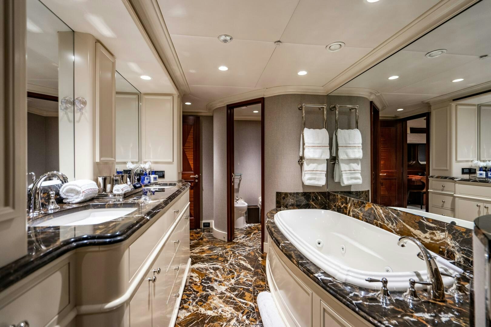 a bathroom with a large bathtub aboard ZEXPLORER Yacht for Sale