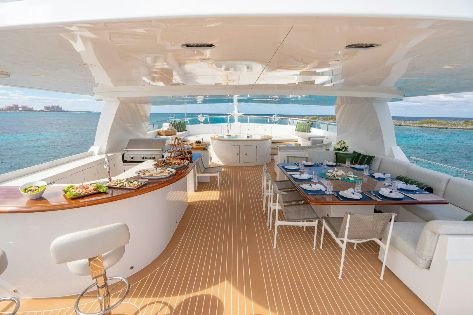 a room with a table chairs and a large window aboard ZEXPLORER Yacht for Sale