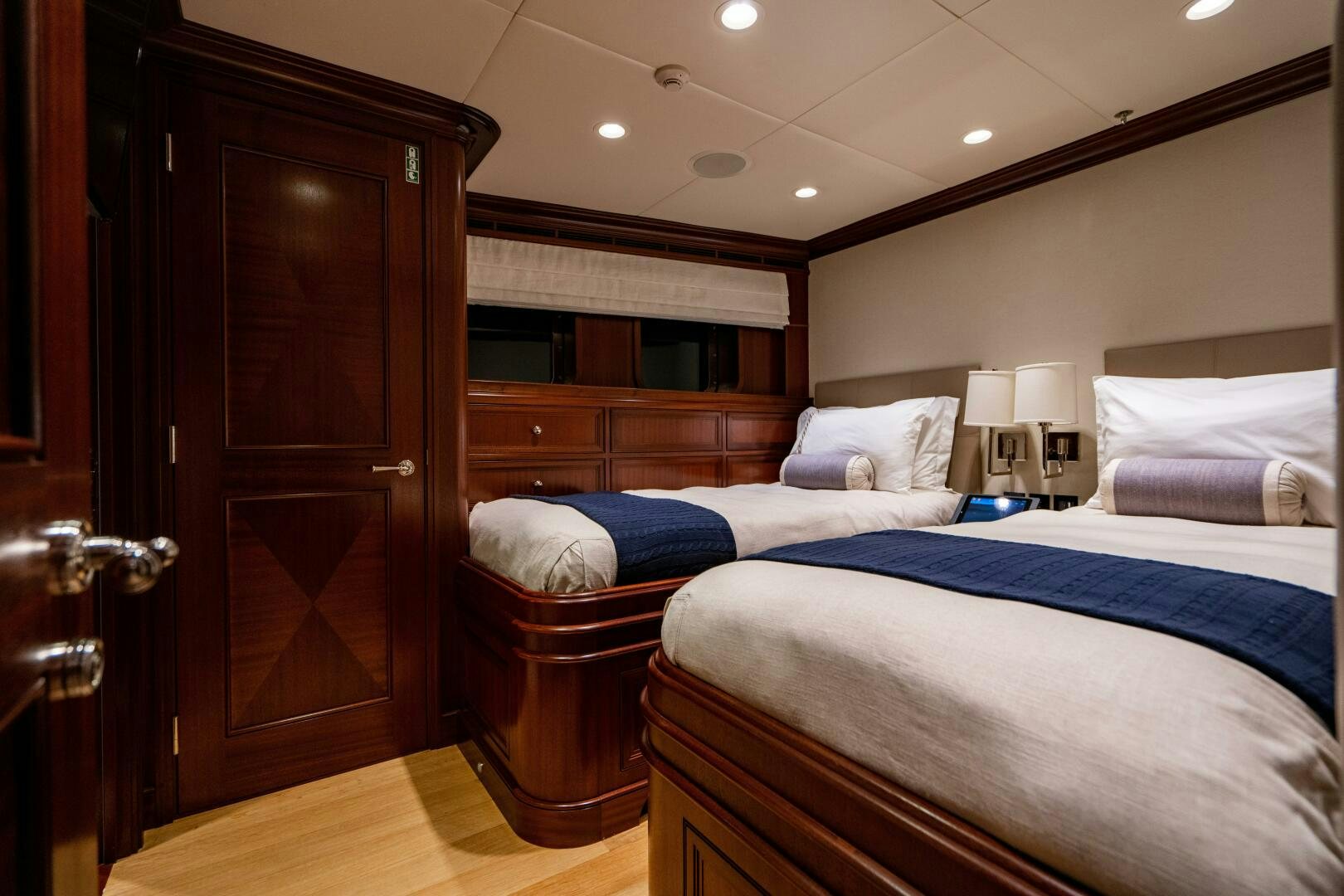 a room with two beds aboard ZEXPLORER Yacht for Sale