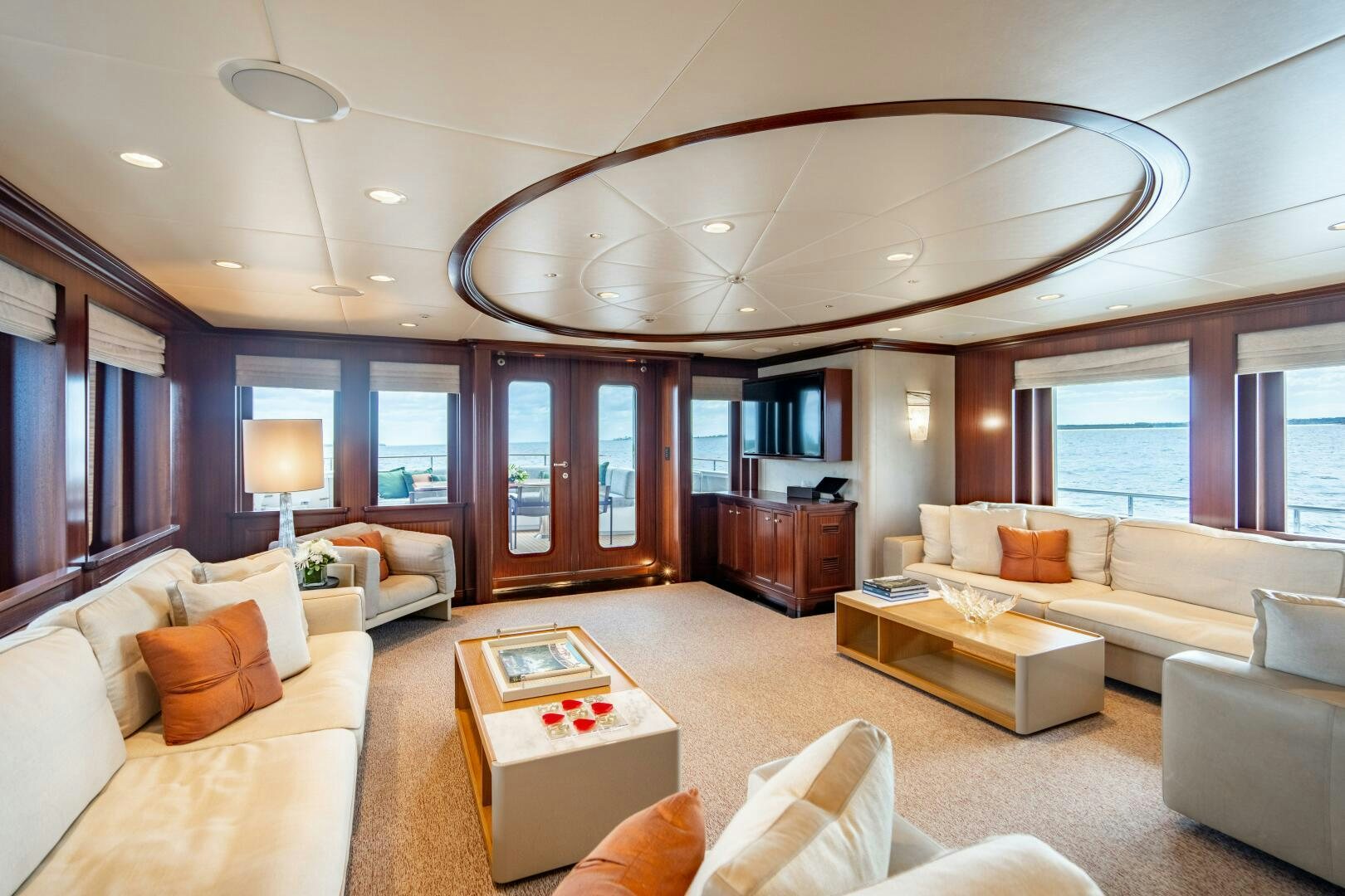a living room with a large window aboard ZEXPLORER Yacht for Sale