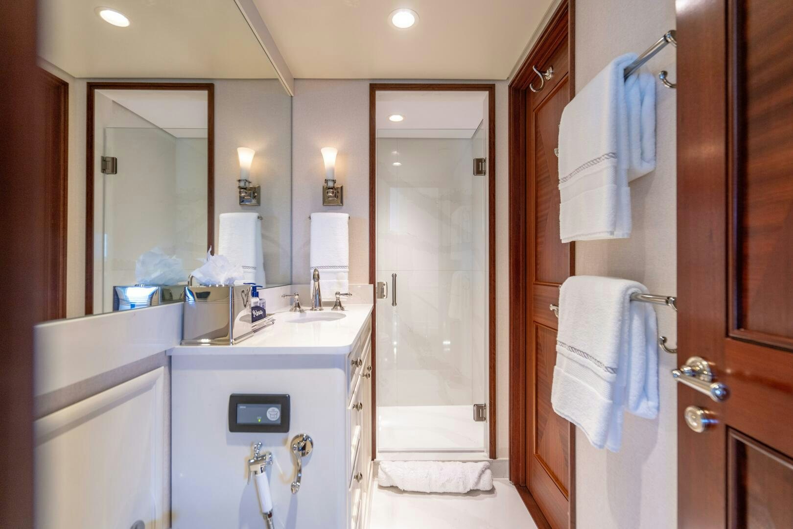 a bathroom with a sink and a mirror aboard ZEXPLORER Yacht for Sale