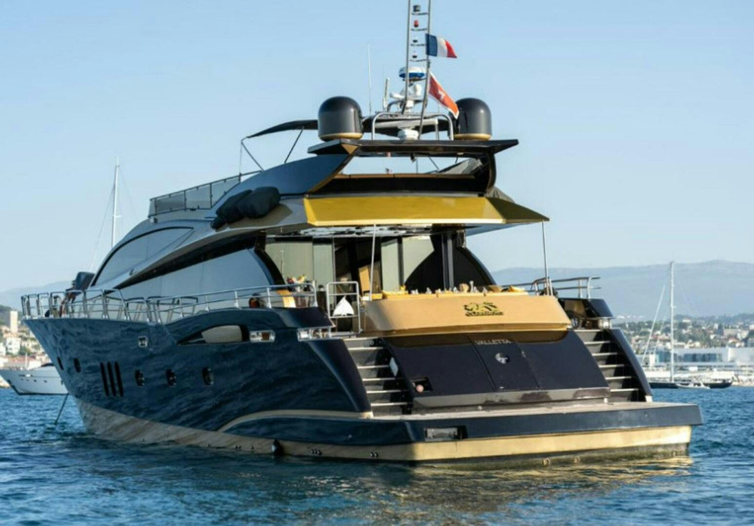 a large boat in the water aboard CLAREMONT Yacht for Sale