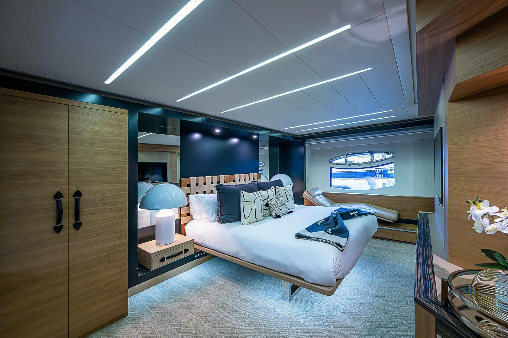 a bedroom with a large bed aboard COAL BLOODED Yacht for Sale