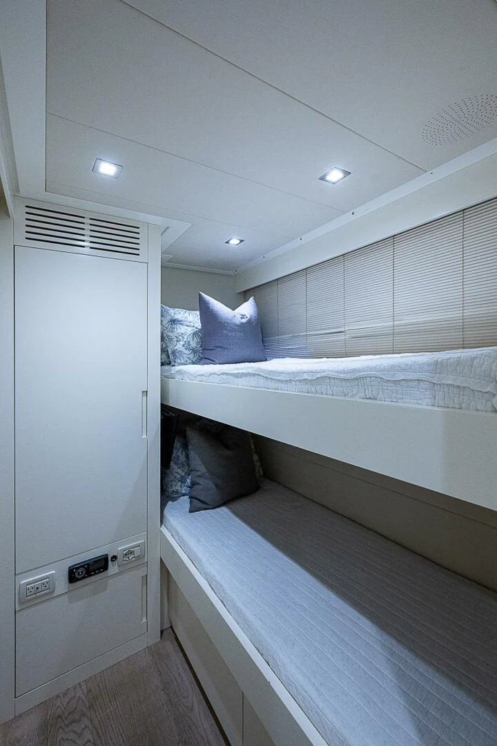 a room with two beds aboard COAL BLOODED Yacht for Sale