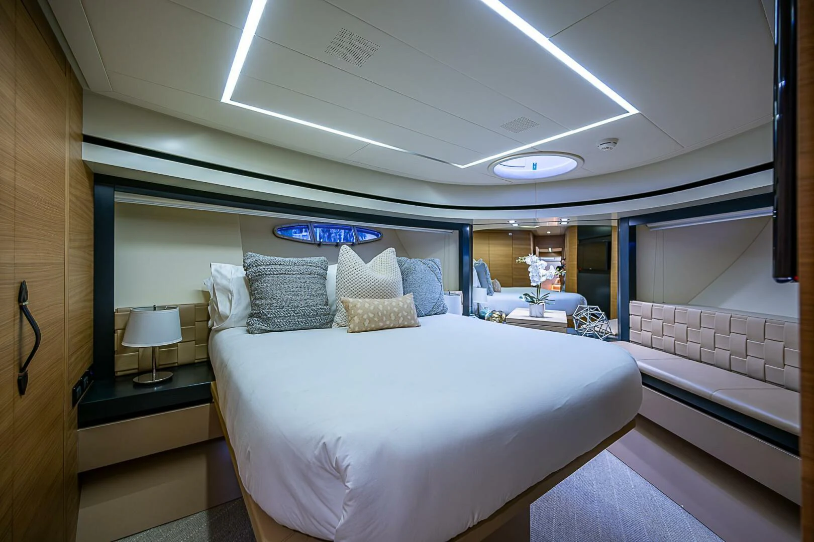 a room with a bed and a chair aboard COAL BLOODED Yacht for Sale
