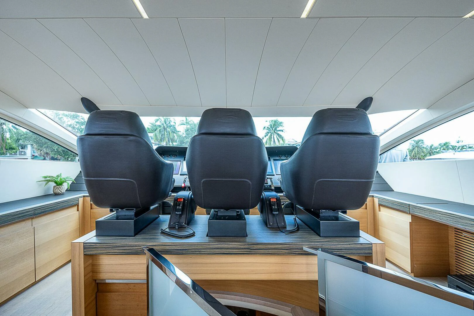 a room with chairs and a desk aboard COAL BLOODED Yacht for Sale