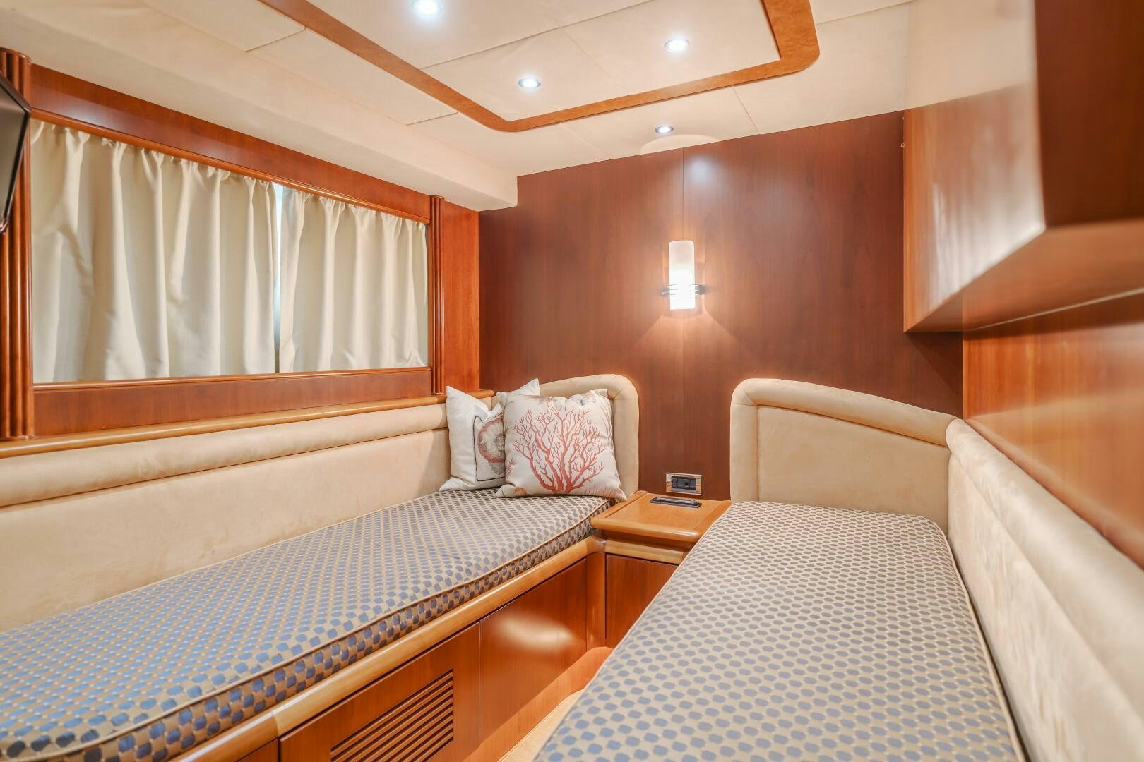 a room with two beds aboard ANEJO Yacht for Sale