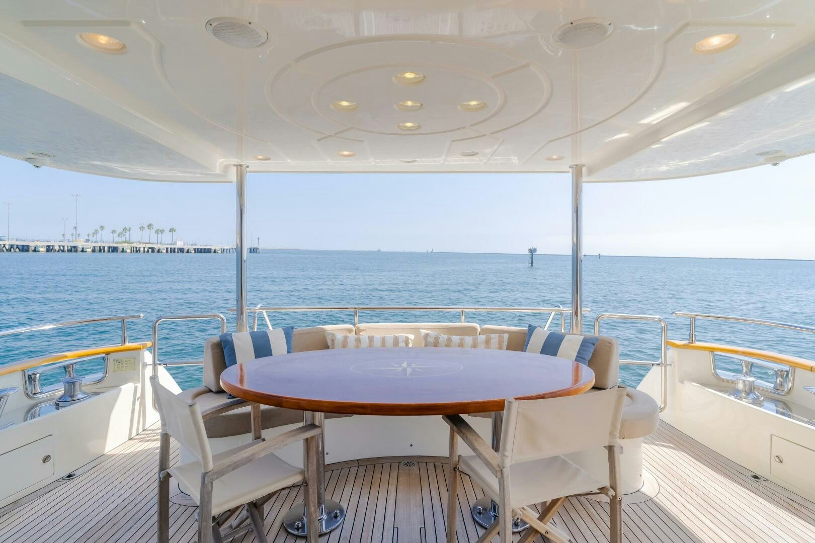 a table and chairs on a boat aboard ANEJO Yacht for Sale