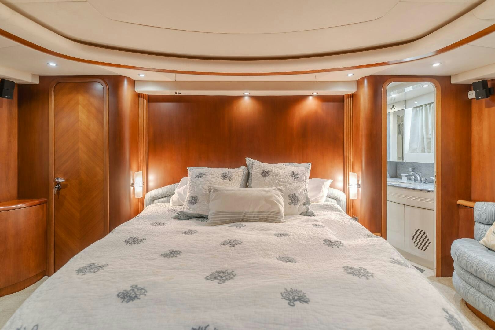 a bed with white sheets aboard ANEJO Yacht for Sale