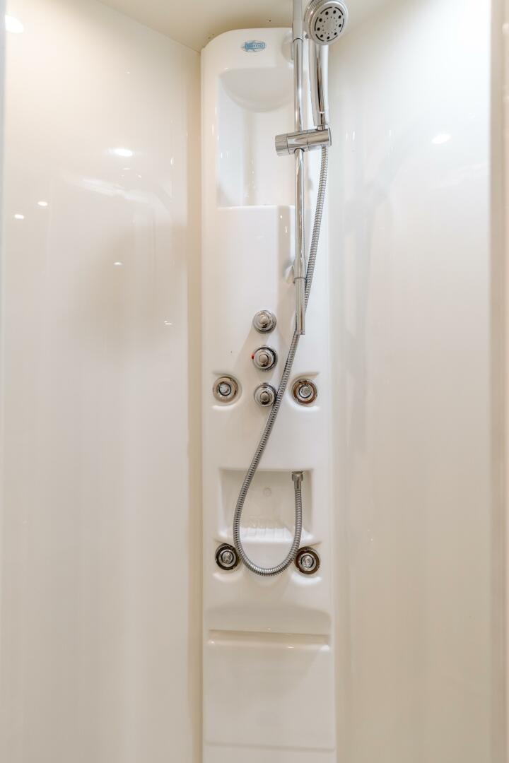 a shower head with water running down the side aboard ANEJO Yacht for Sale