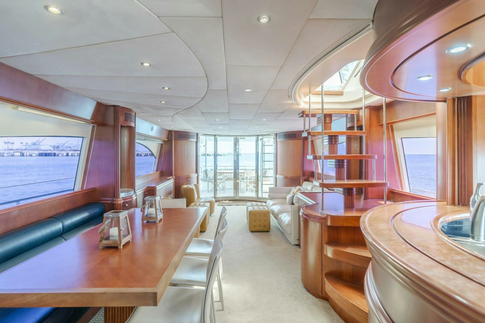 a large living room with a large window aboard ANEJO Yacht for Sale