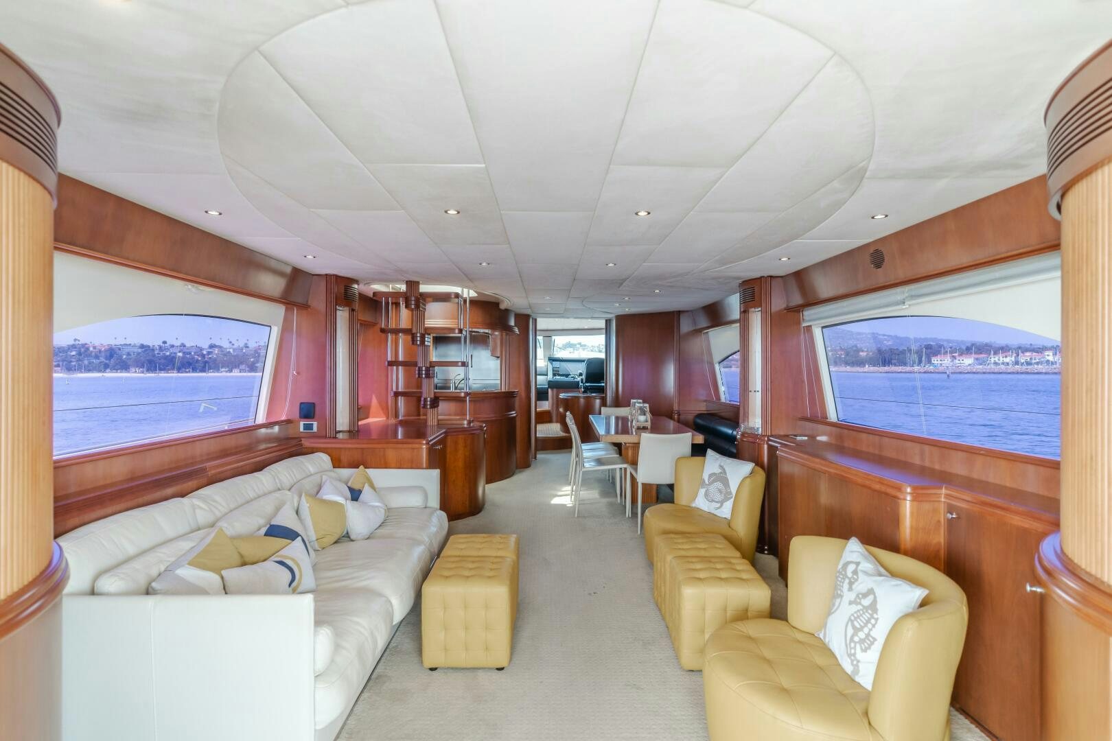 a room with a bed and a couch aboard ANEJO Yacht for Sale