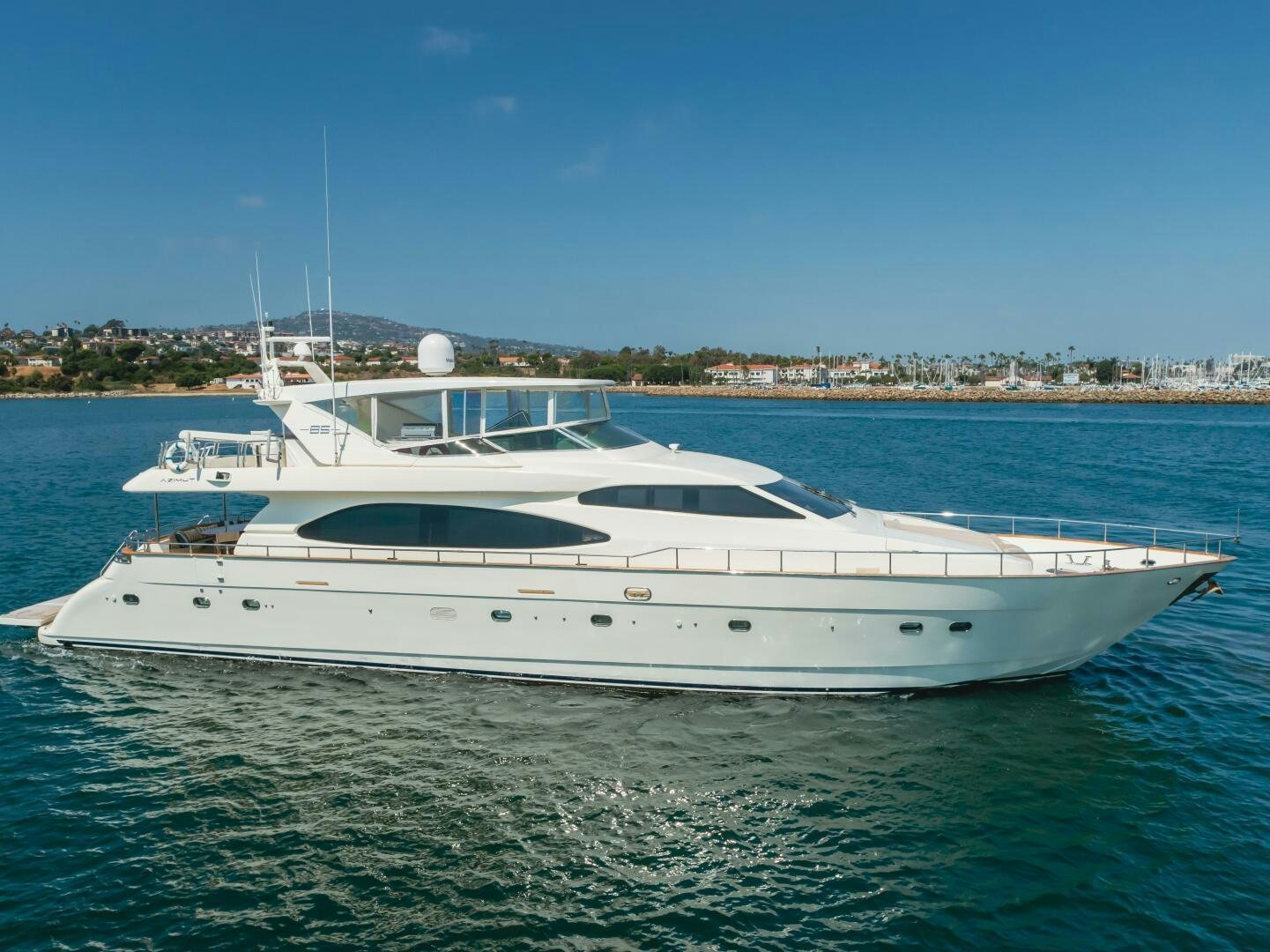 a white yacht in the water aboard ANEJO Yacht for Sale