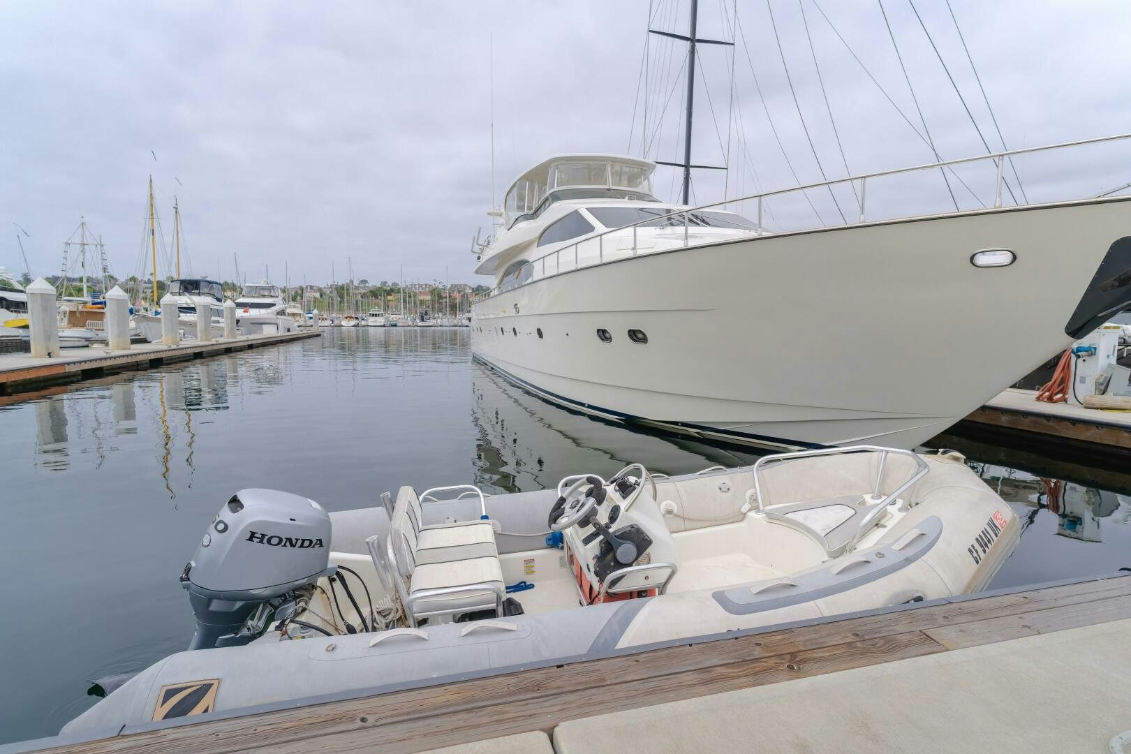 a boat docked at a pier aboard ANEJO Yacht for Sale
