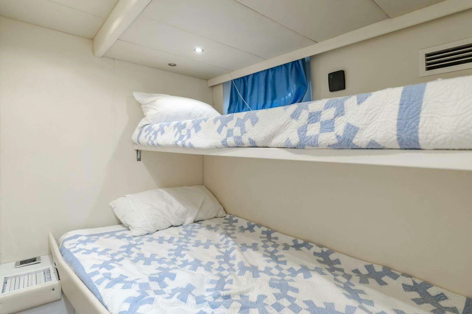 a couple of beds in a room aboard ANEJO Yacht for Sale