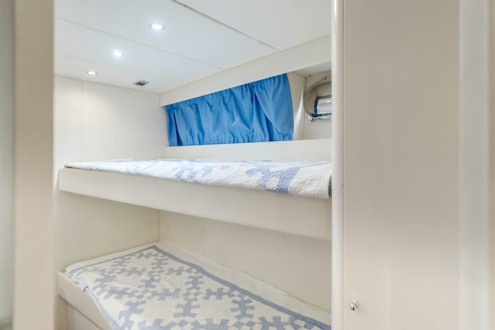 a couple of beds in a room aboard ANEJO Yacht for Sale