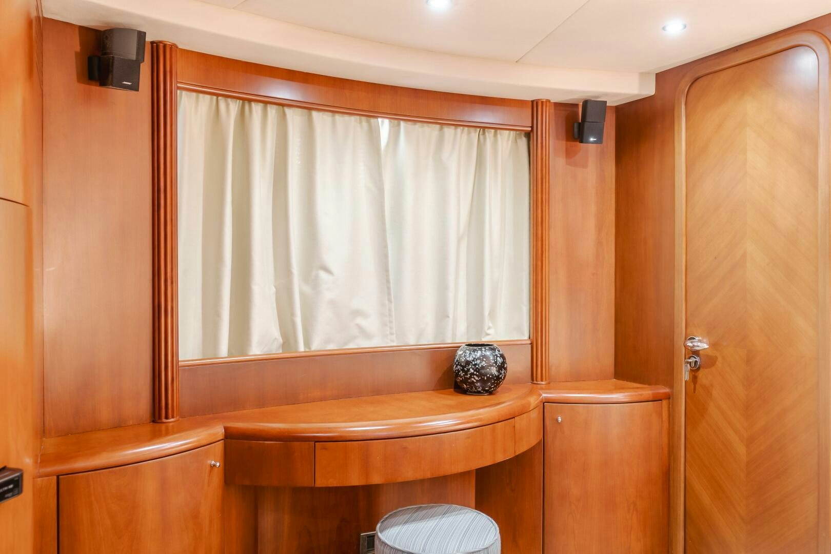 a bathroom with a wood cabinet aboard ANEJO Yacht for Sale