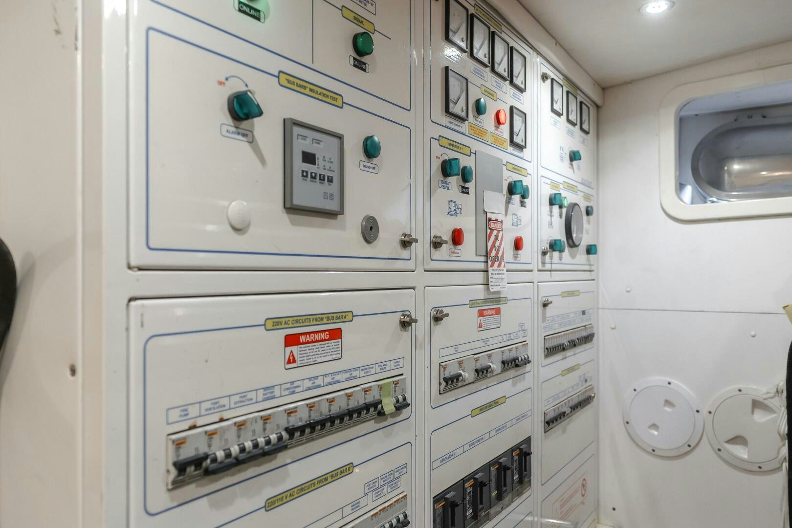 a white electrical cabinet aboard ANEJO Yacht for Sale