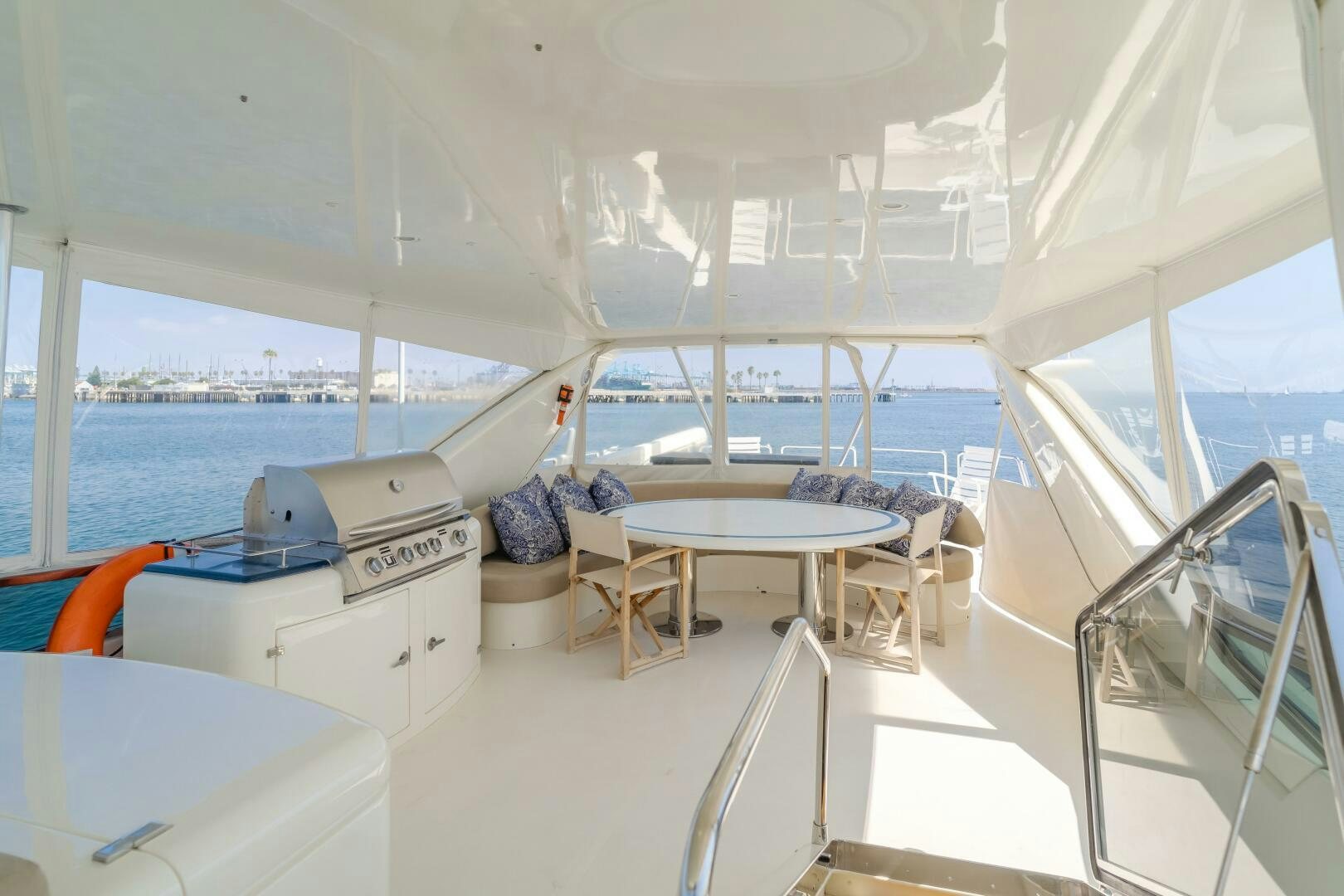 a boat with a table and chairs aboard ANEJO Yacht for Sale