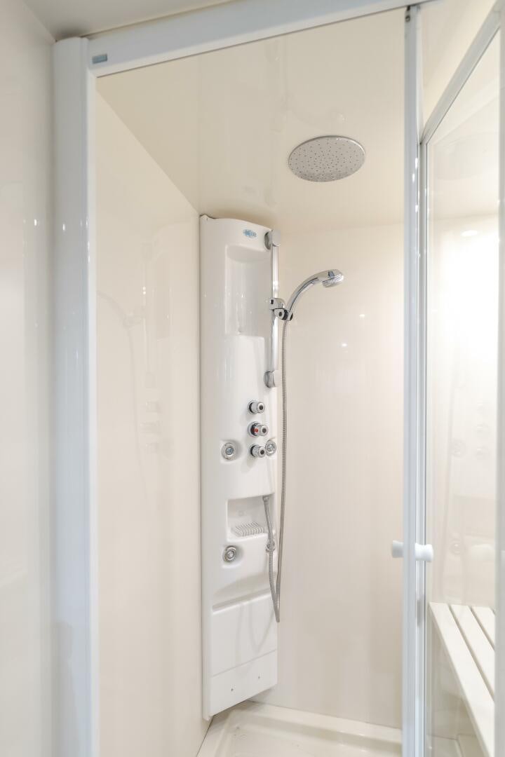 a shower with a glass door aboard ANEJO Yacht for Sale