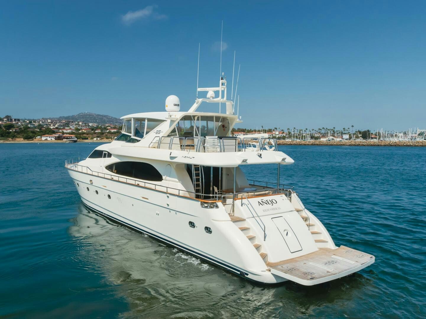 a white boat in the water aboard ANEJO Yacht for Sale