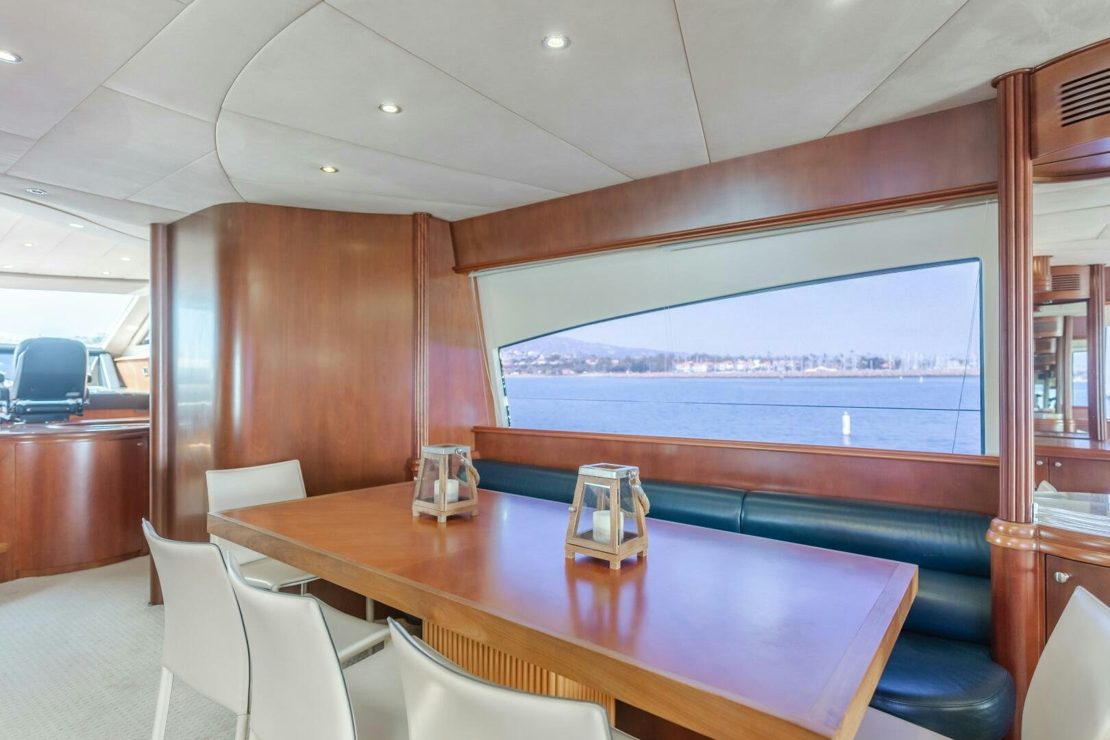 a conference room with a large screen aboard ANEJO Yacht for Sale