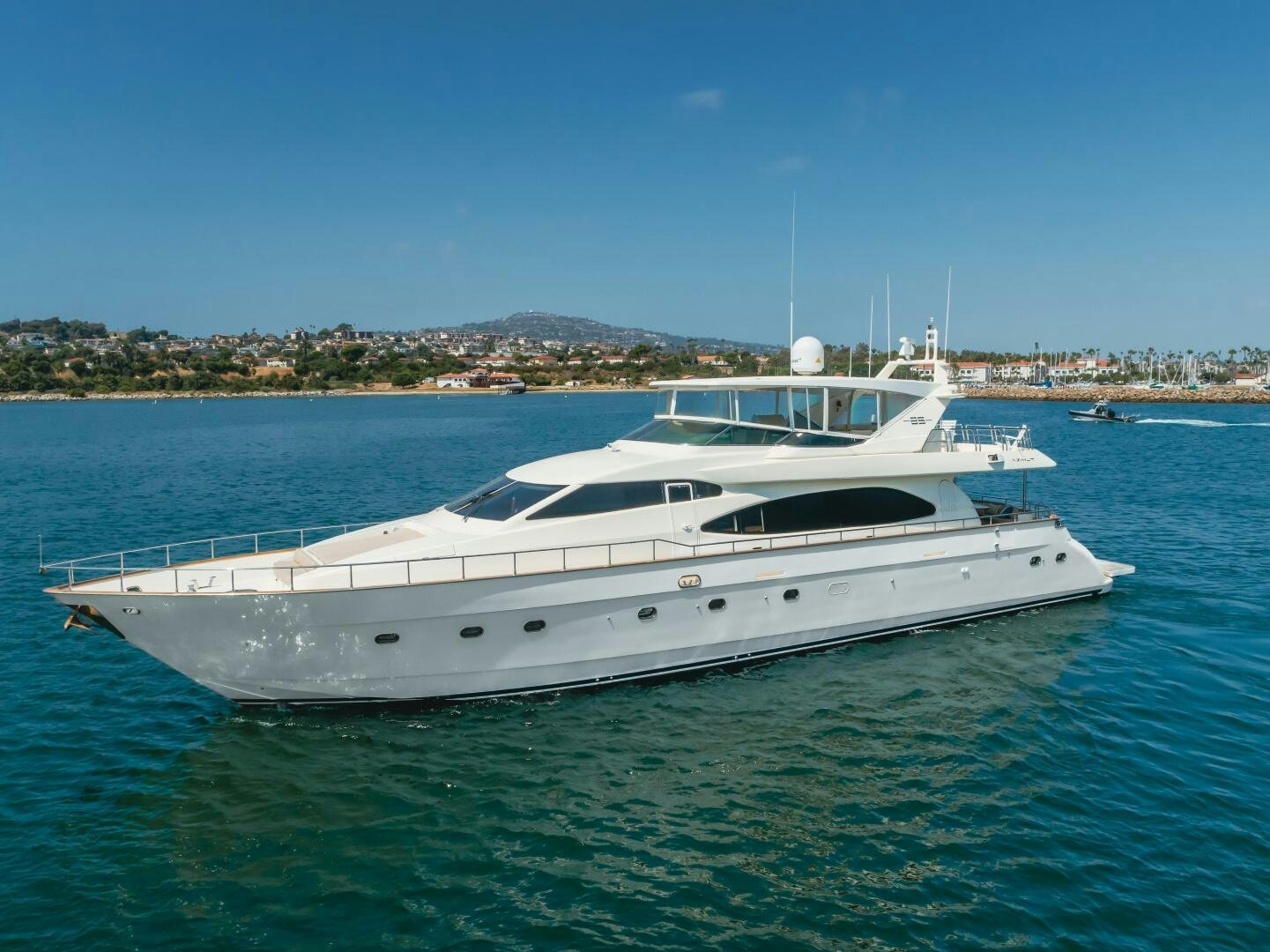 a white yacht in the water aboard ANEJO Yacht for Sale