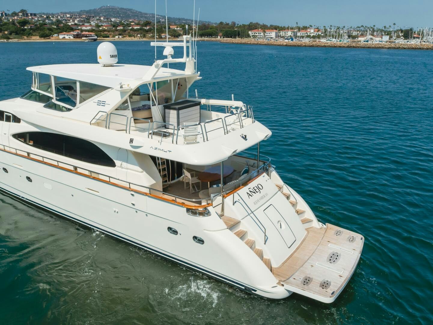a large white boat in the water aboard ANEJO Yacht for Sale