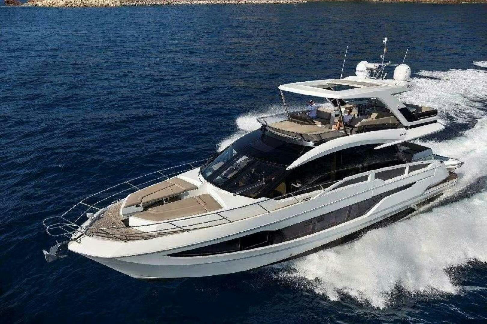 a boat on the water aboard TRIPLE T Yacht for Sale