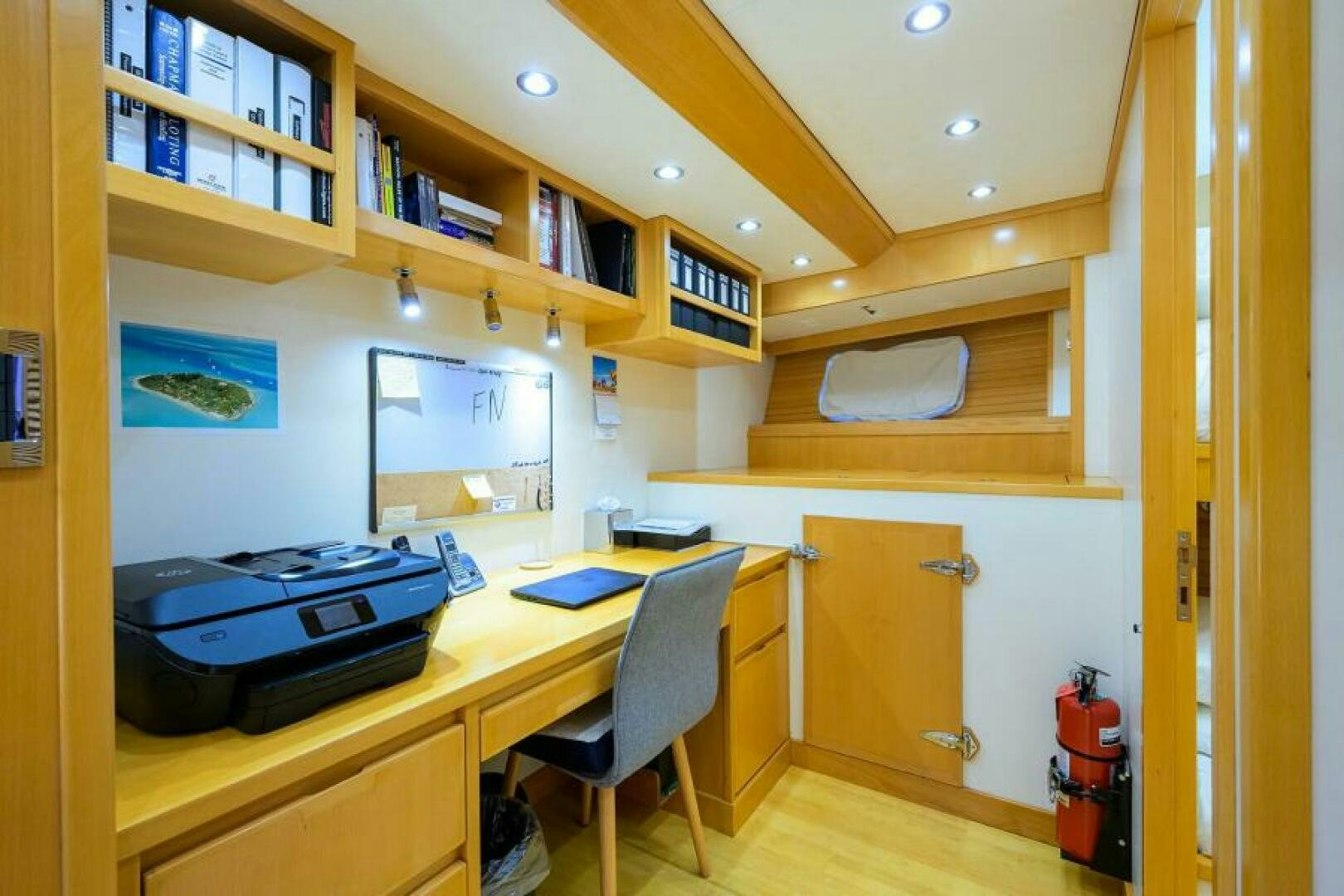a room with a desk and a computer aboard ELECTRA Yacht for Sale