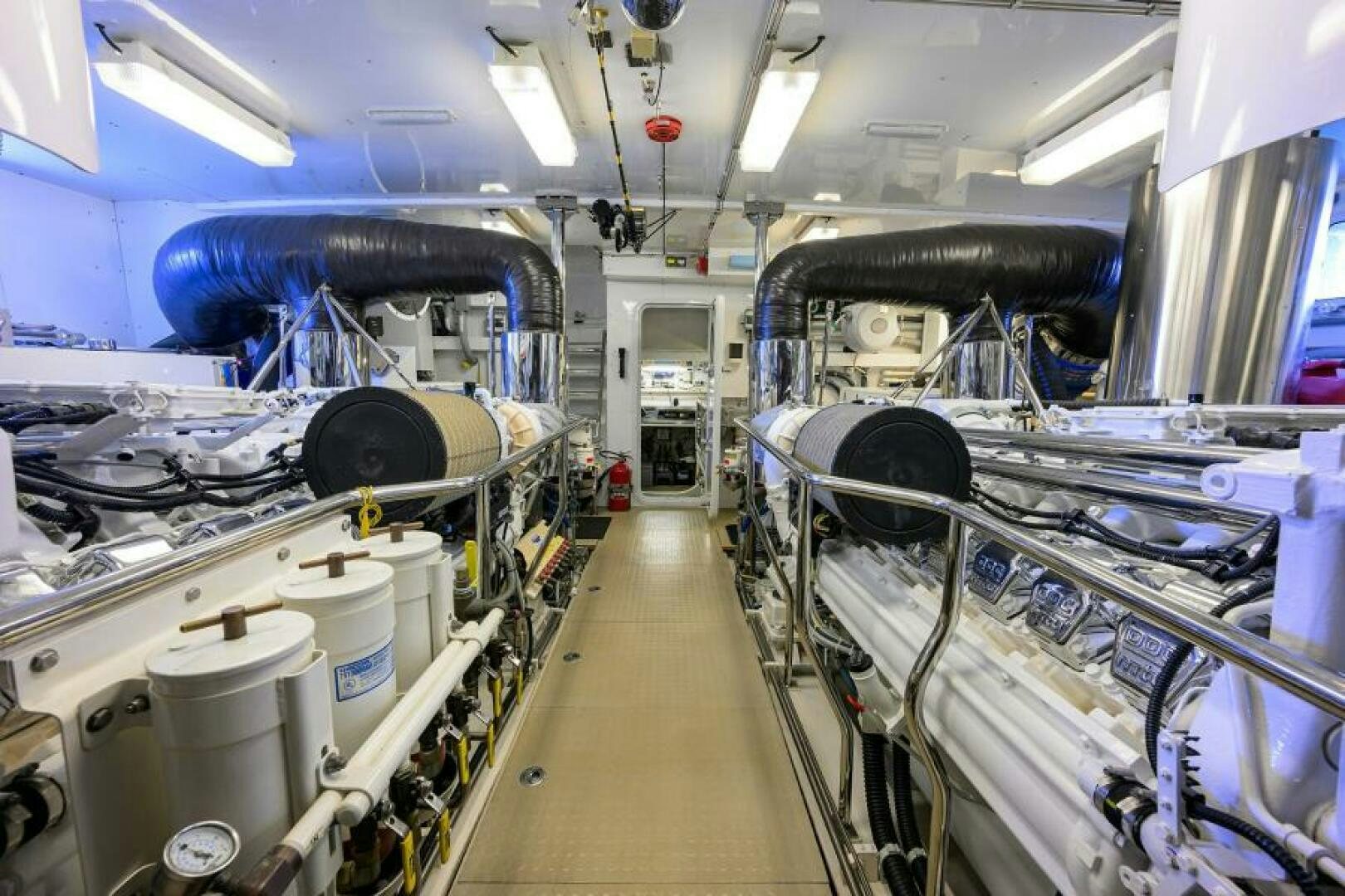 a room with large machinery aboard ELECTRA Yacht for Sale