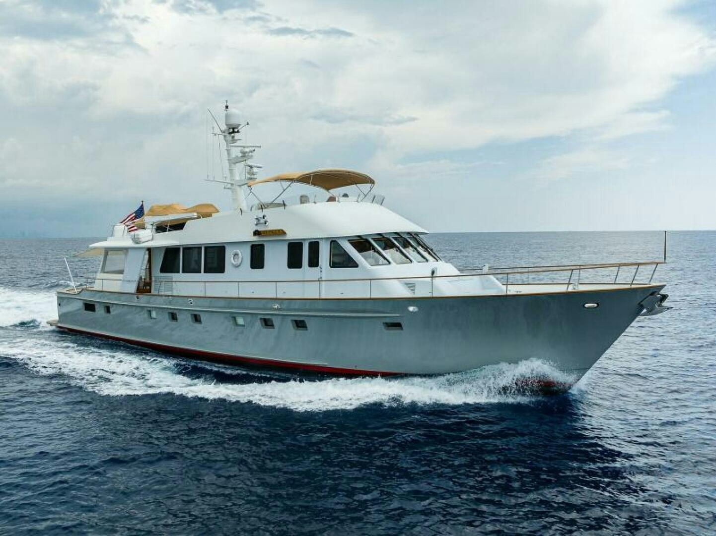 a large white boat in the water aboard ELECTRA Yacht for Sale