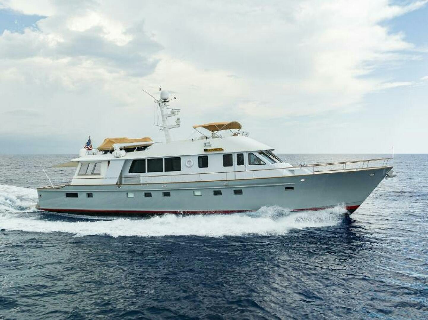 a large white boat aboard ELECTRA Yacht for Sale
