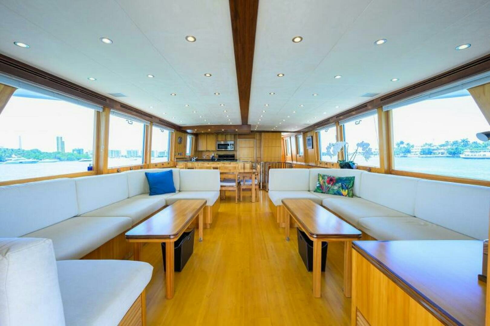 a living room with a couch and a table aboard ELECTRA Yacht for Sale