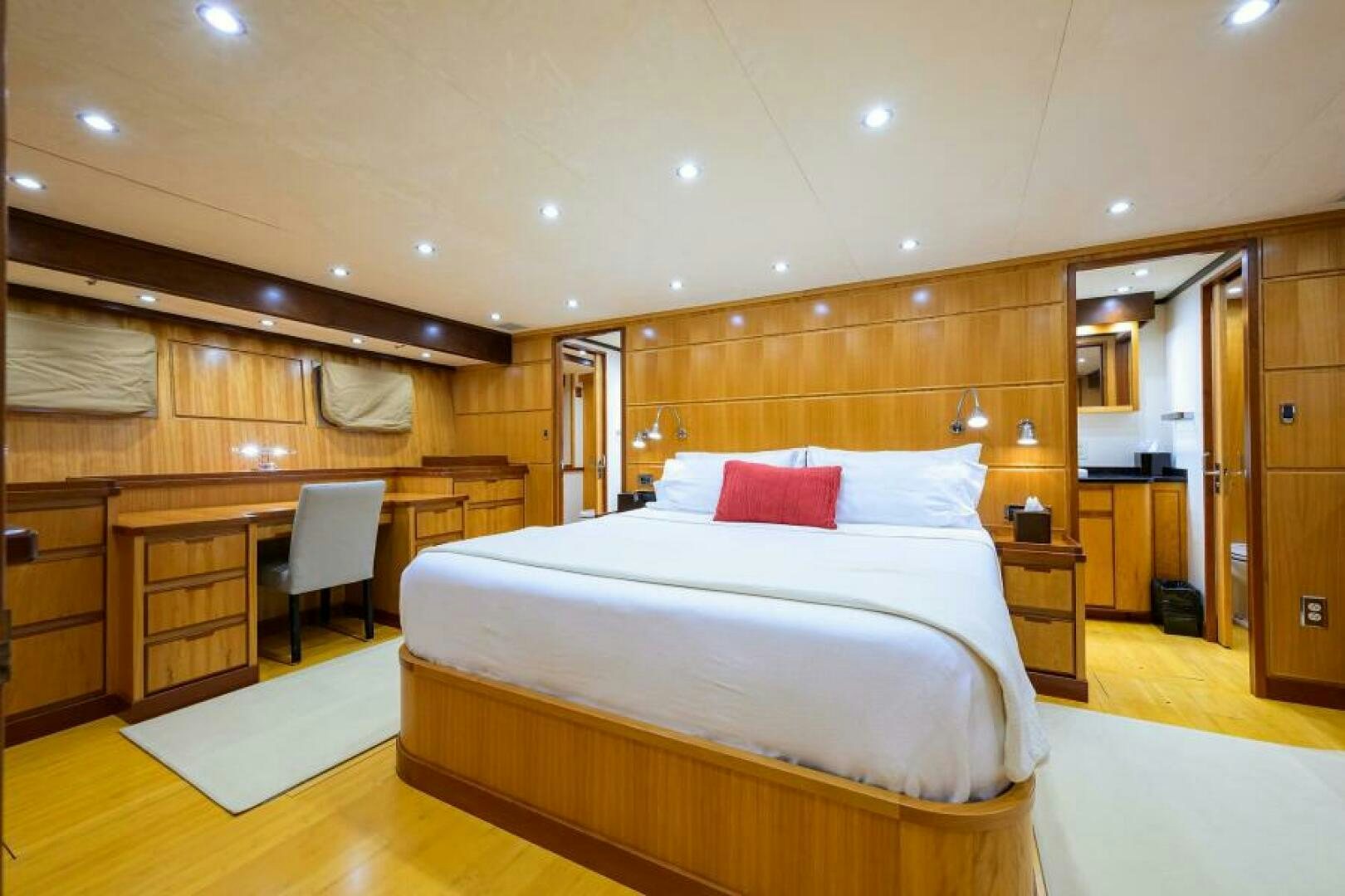 a room with a bed and a desk aboard ELECTRA Yacht for Sale