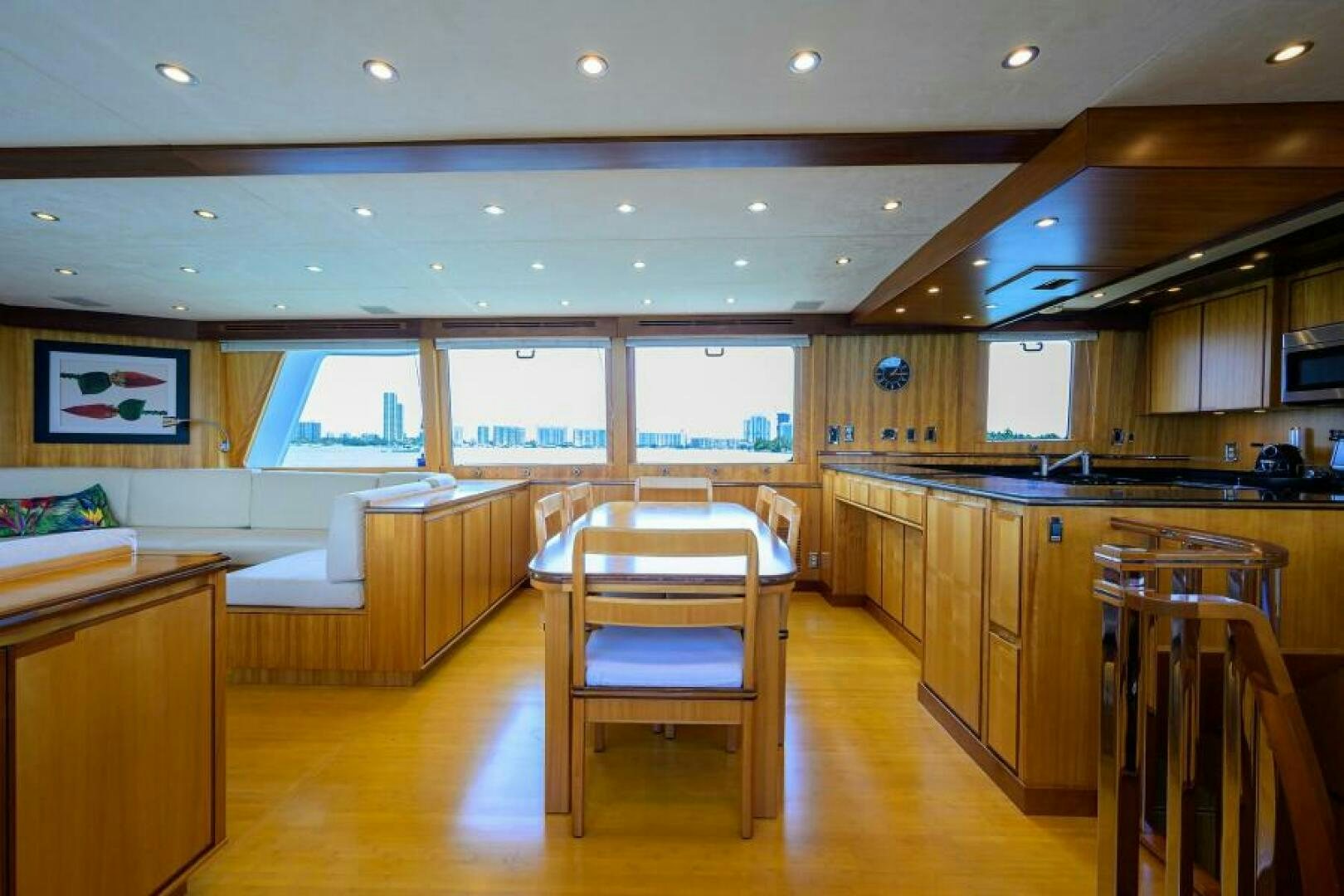 a large kitchen with wooden cabinets aboard ELECTRA Yacht for Sale