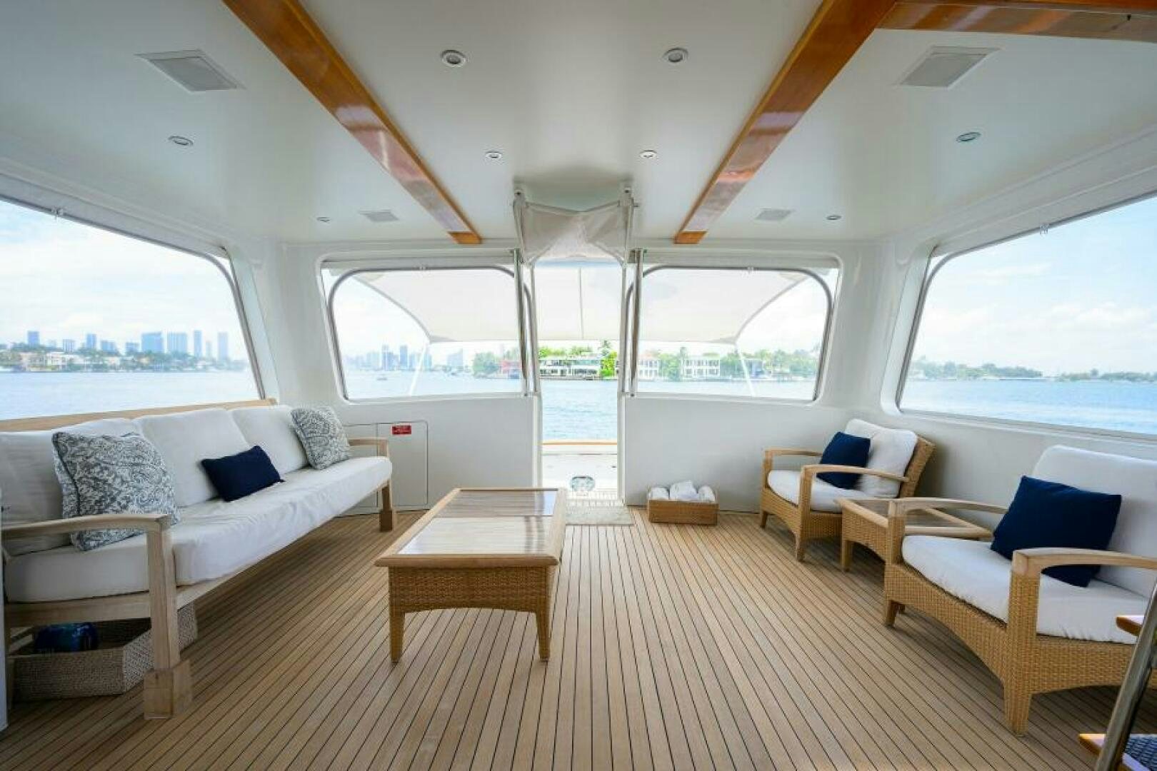 a living room with a large window aboard ELECTRA Yacht for Sale