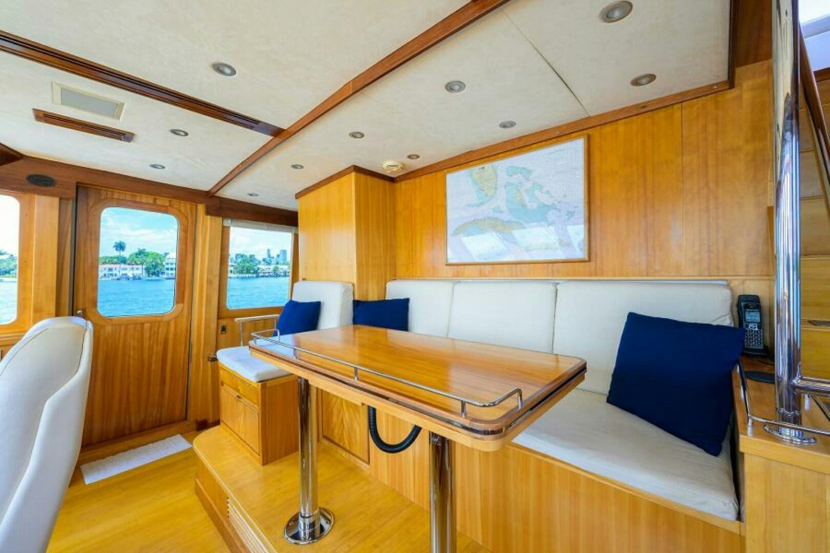 a room with a bed and desk aboard ELECTRA Yacht for Sale
