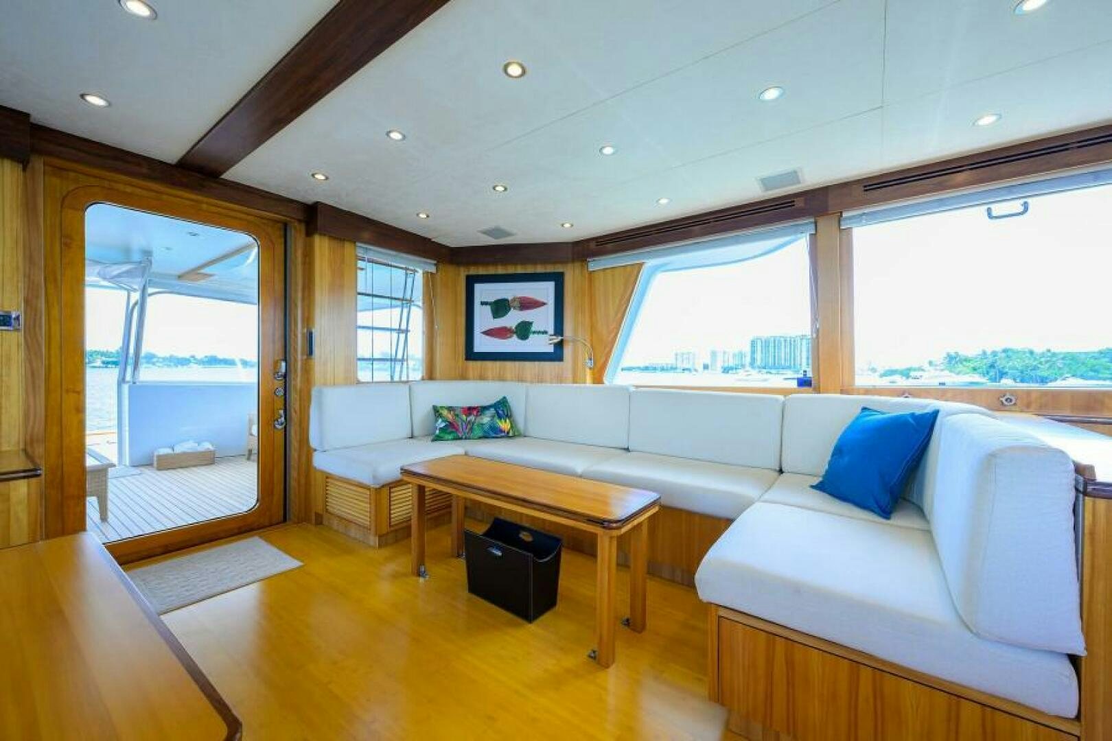 a living room with a couch and a table aboard ELECTRA Yacht for Sale