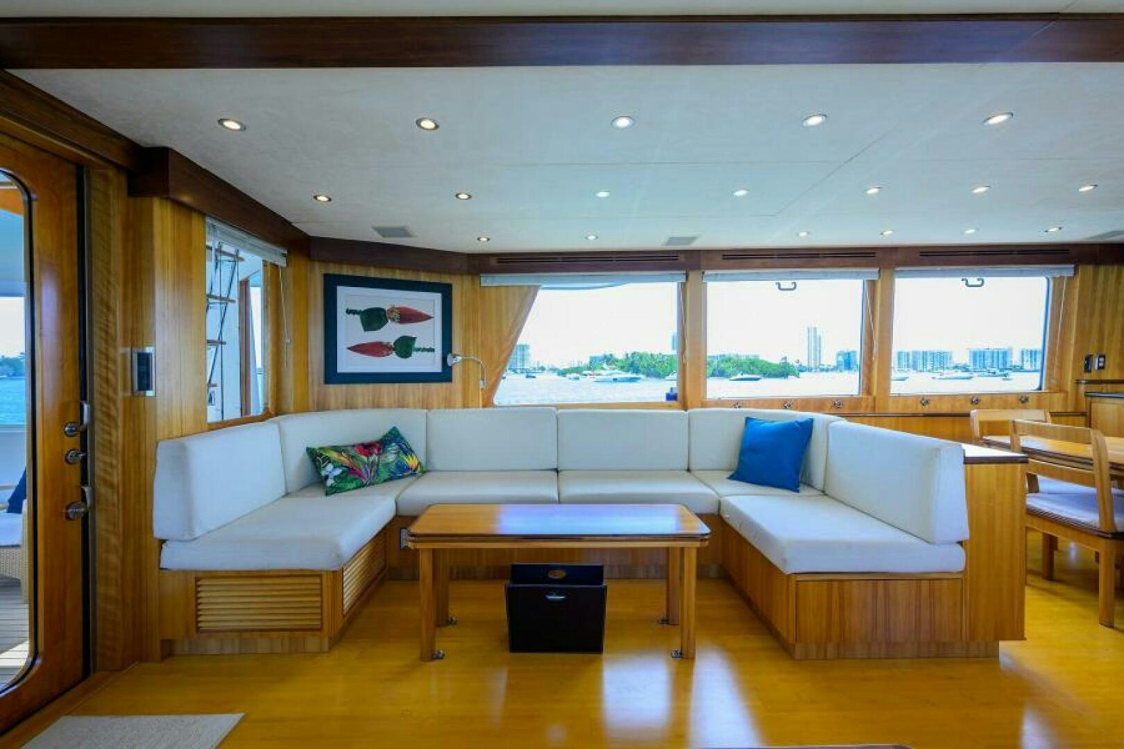 a living room with a couch and a coffee table aboard ELECTRA Yacht for Sale