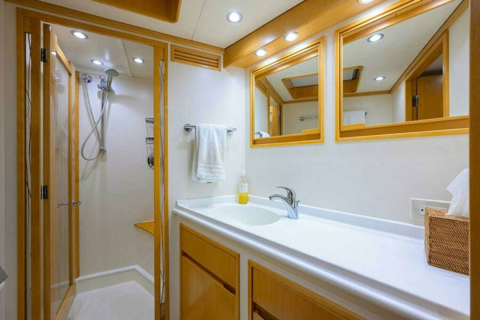 a bathroom with a shower and sink aboard ELECTRA Yacht for Sale